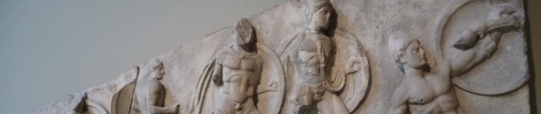 cropped-parthanon-relief-greek-soldiers.jpg